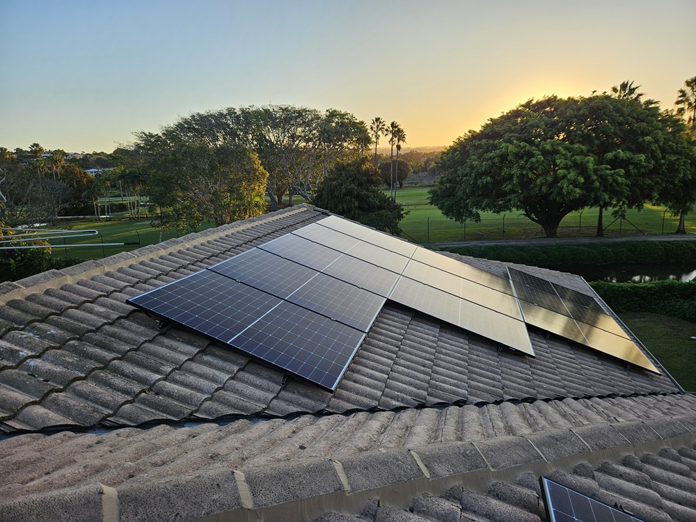 Electrician working on home energy system